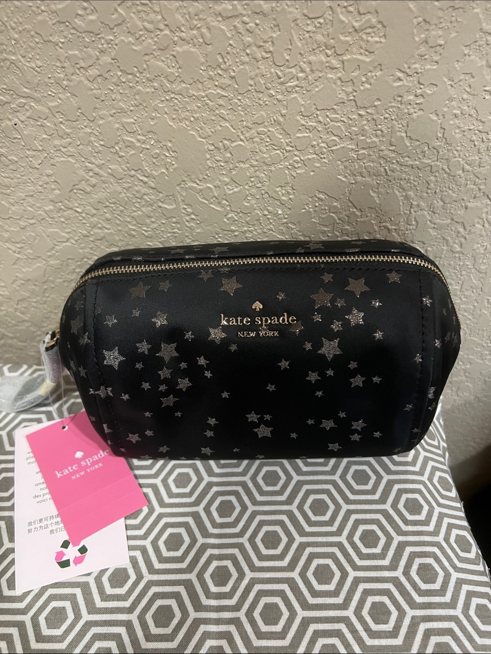 kate spade black cosmetic pouch with silver star print